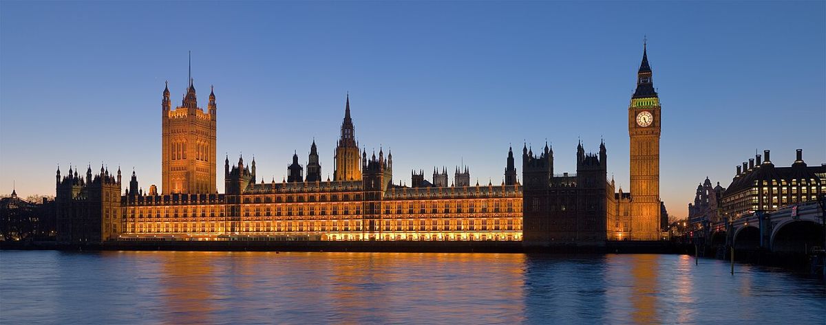 Palace of Westminster beside the Thames.